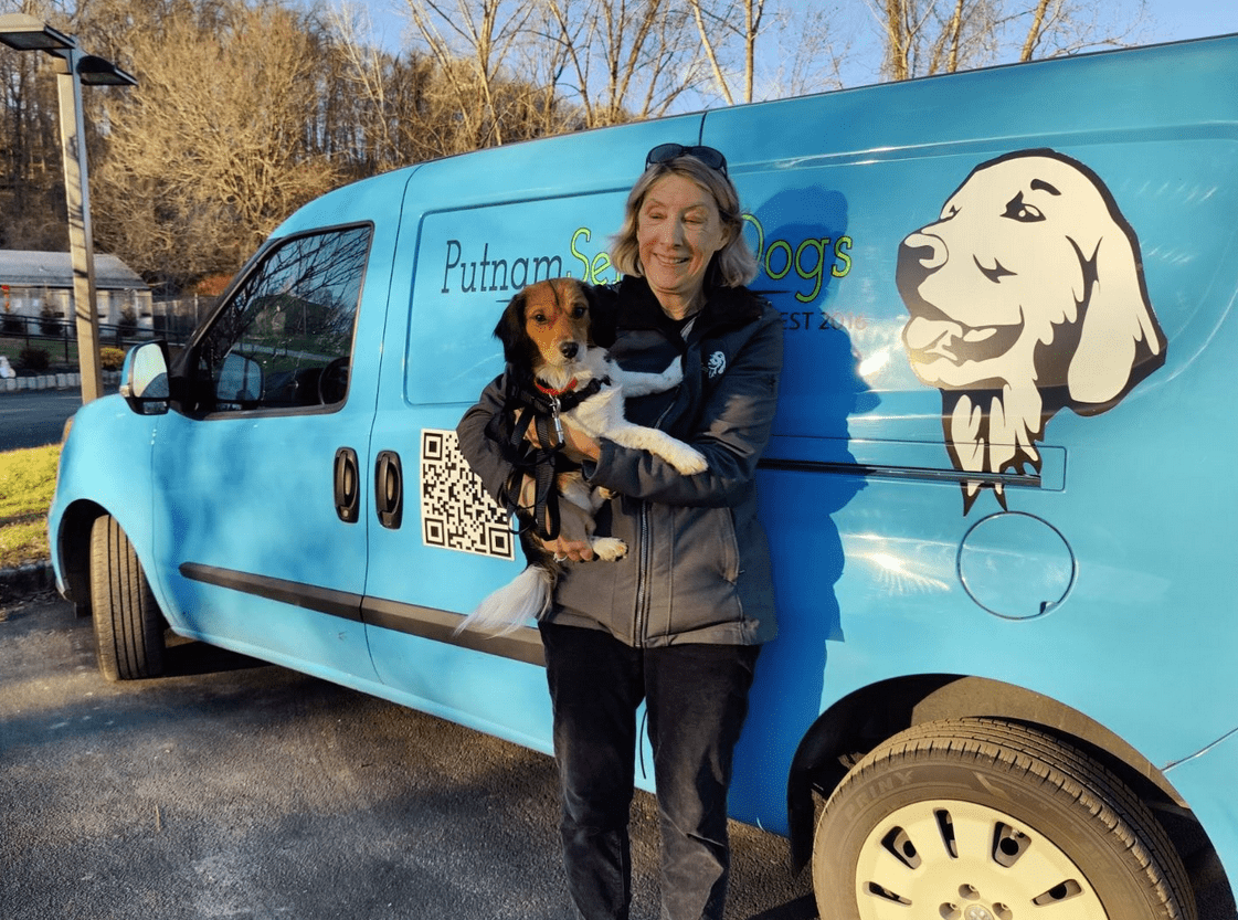 Nancy Teague with a new service puppy