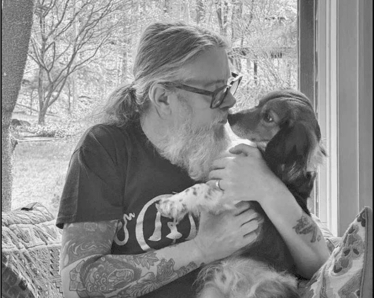 Putnam County Times, David (veteran) with service dog, Gizmo