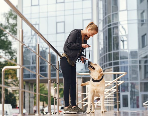 Portrait of a woman with her beautiful dog