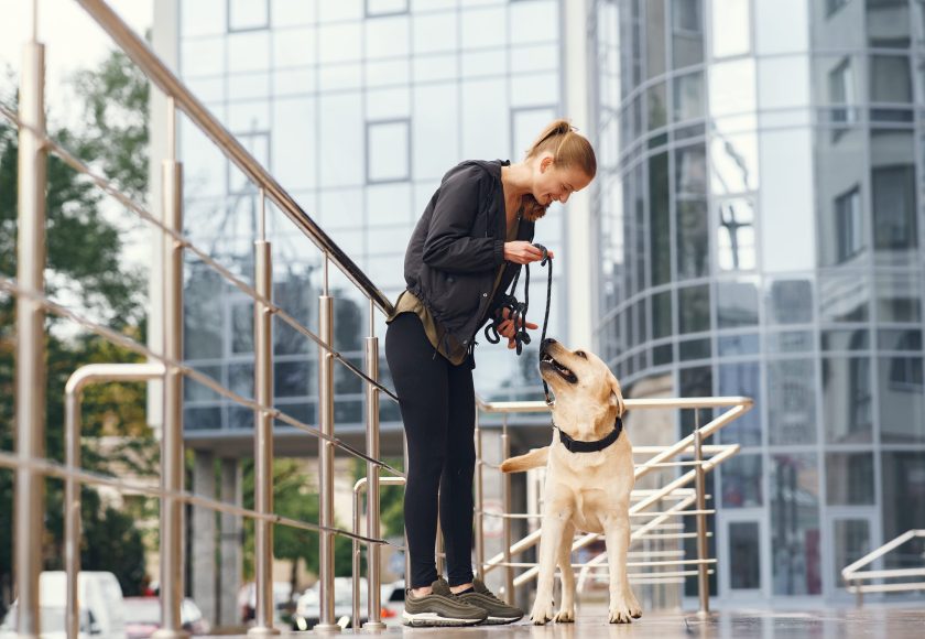 Portrait of a woman with her beautiful dog